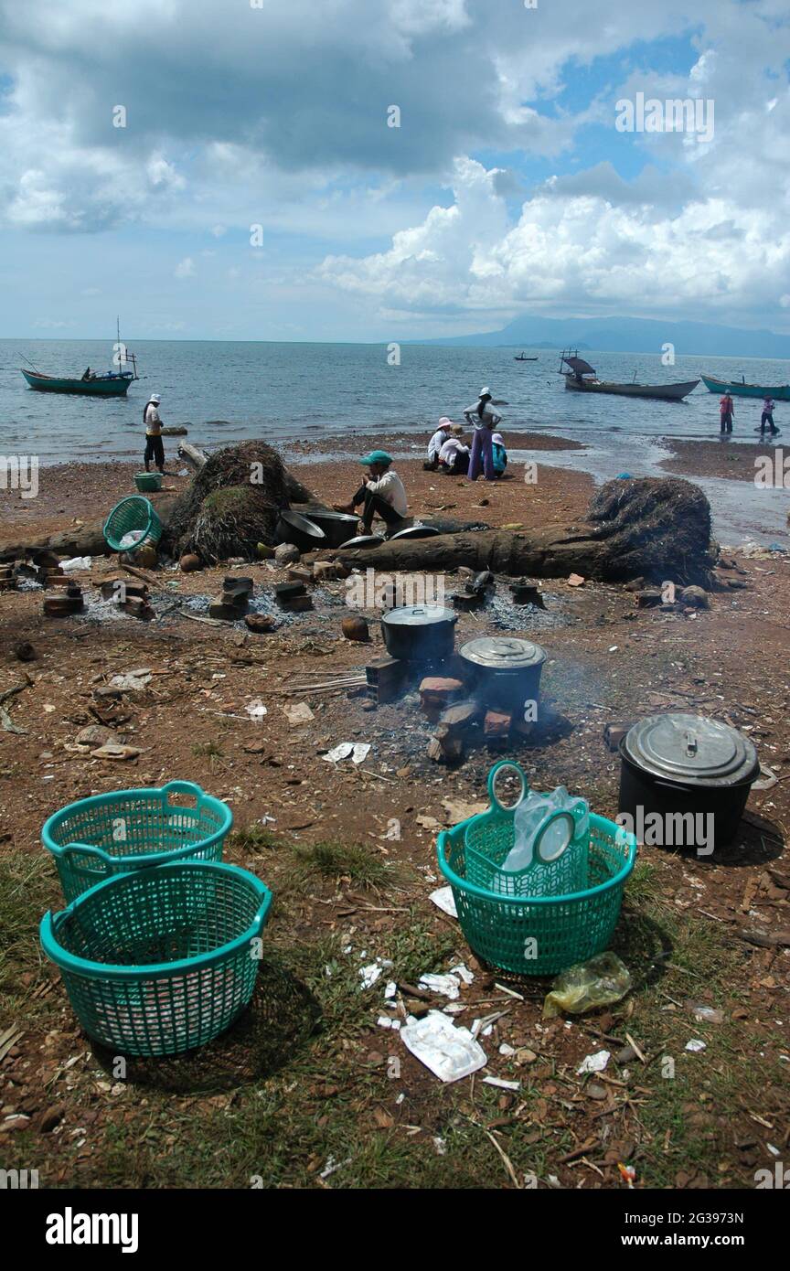 The wrapped up crab market, at the beach in Kep, Cambodia. Fishermen cooking simple meals in the