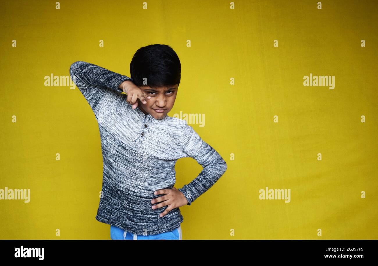 A Indian Boy Pose For Camera For Fashion Shoot. Stock Photo, Picture and  Royalty Free Image. Image 164634450.