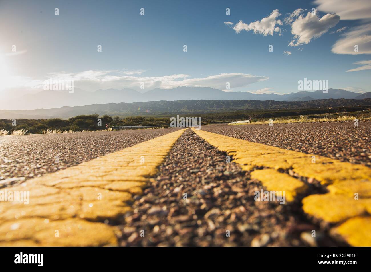 road receding into the distance with a dividing strip Stock Photo