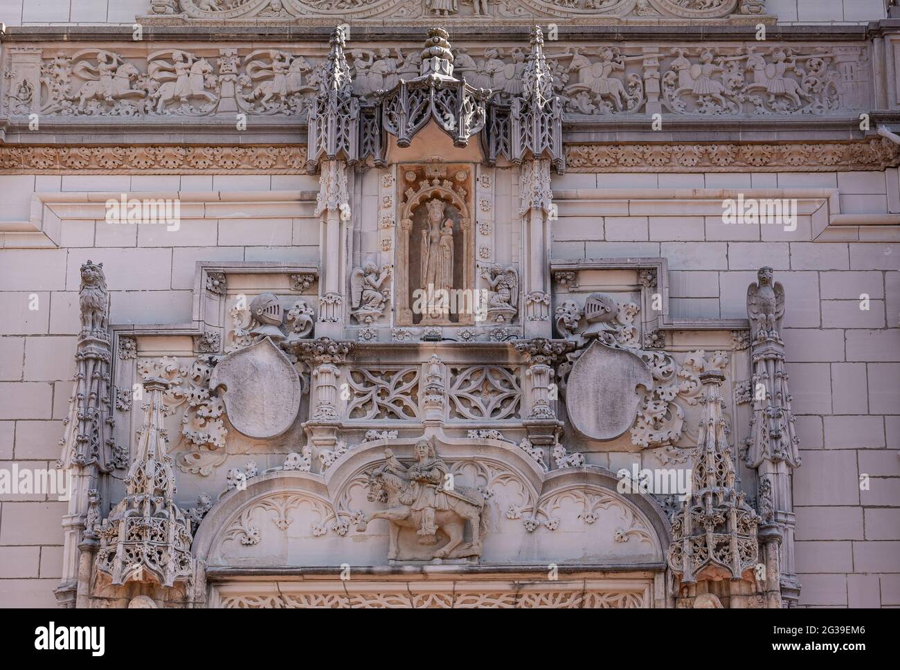 San Simeon, CA, USA - February 12, 2014: Hearst Castle. Closeup of statues and sculptures on mural over main entrance door. Stock Photo