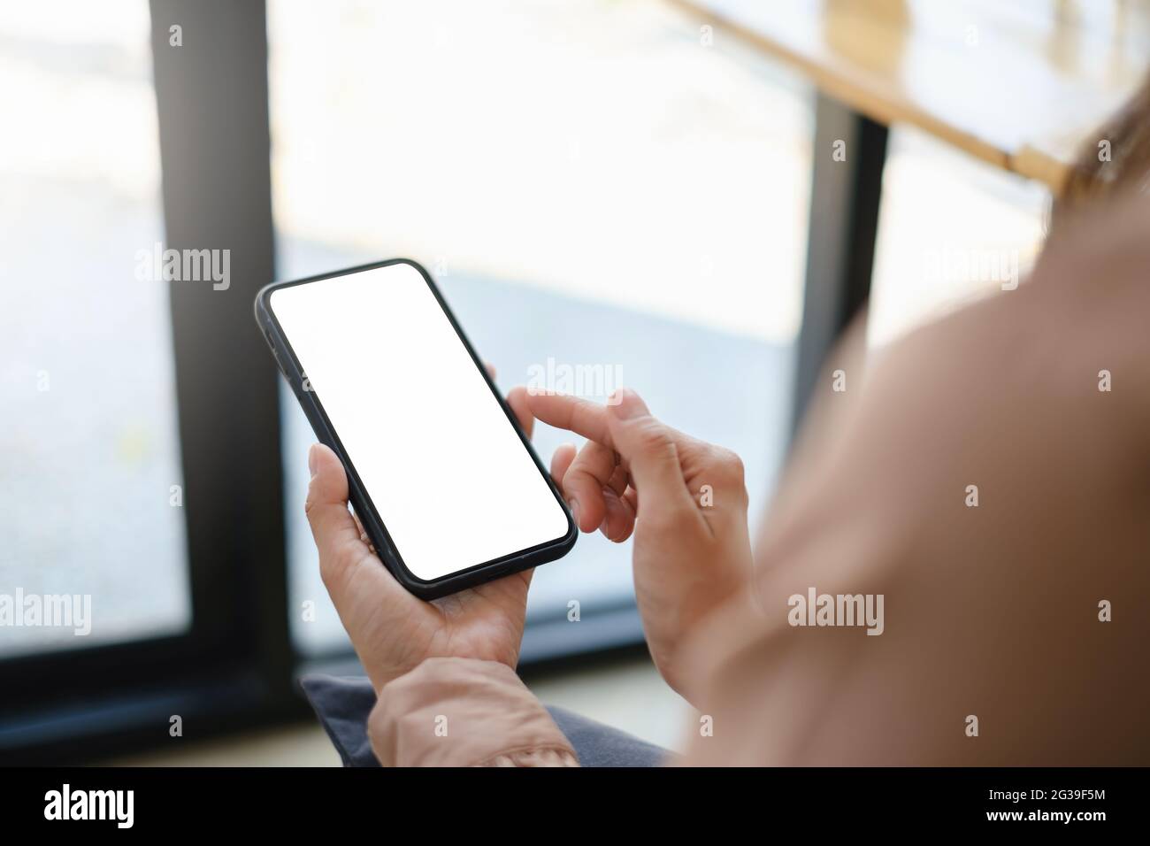 A woman hand holding smartphone device with blank screen Stock Photo ...