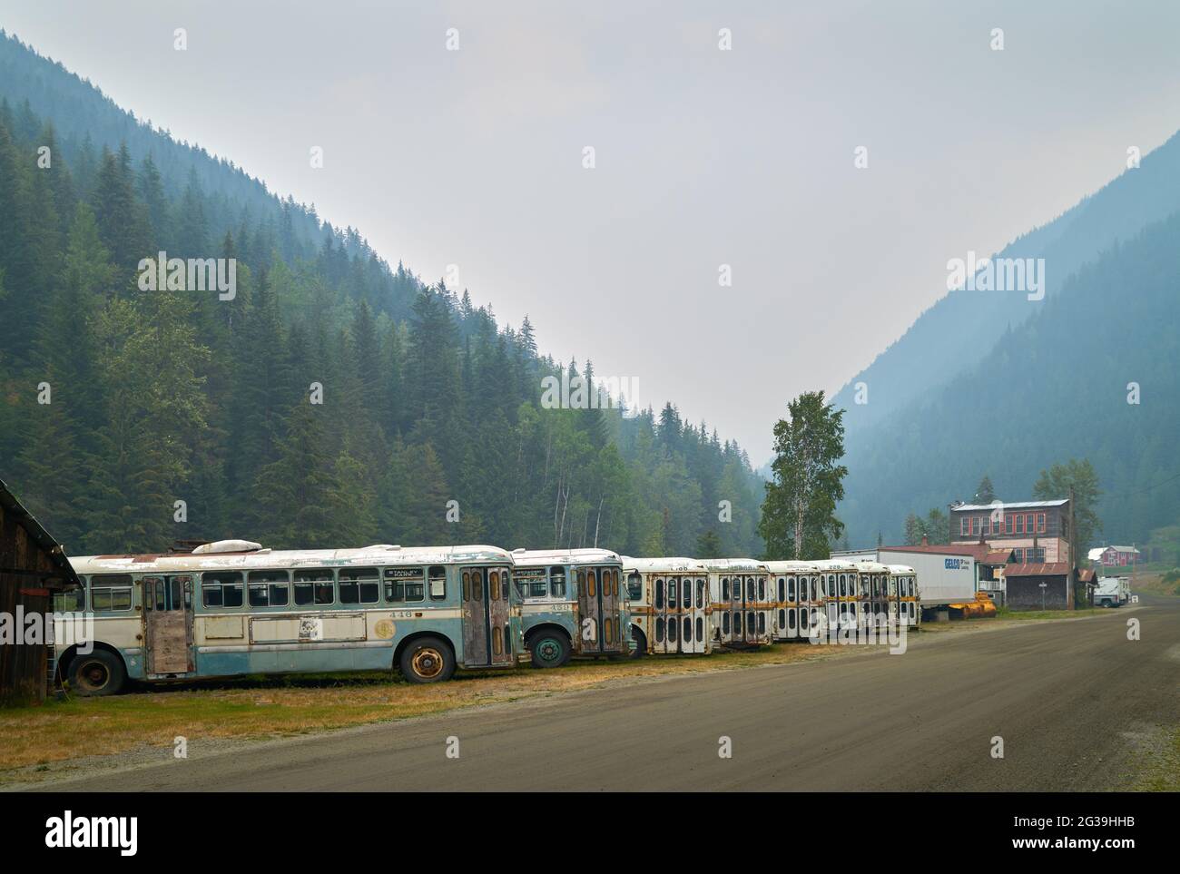 Sandon, British Columbia, Canada - August 24, 2018. Sandon Historic Buses. Old Vancouver buses parked in the Kootenay ghost town of Sandon, BC. Stock Photo
