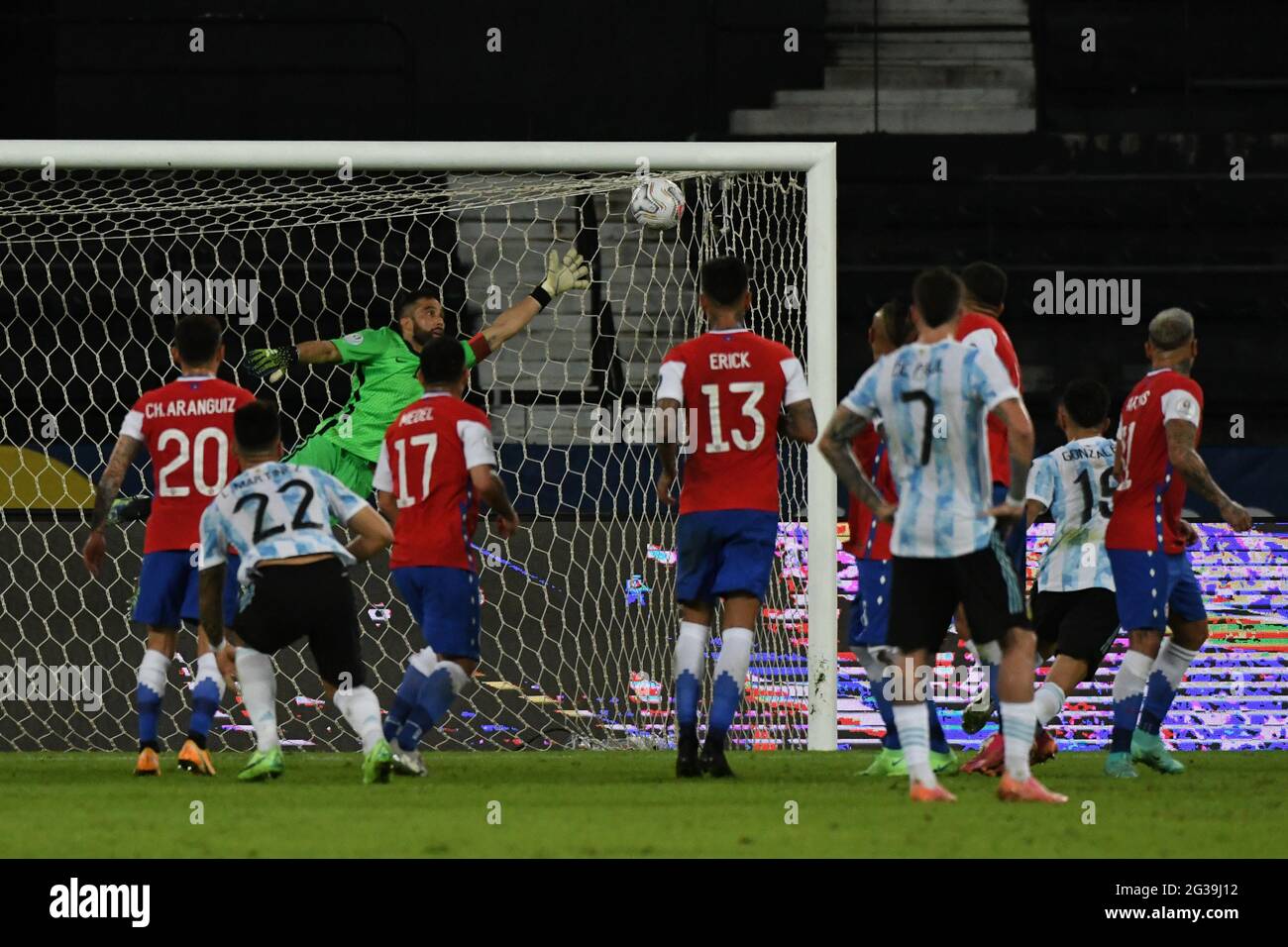 Rio De Janeiro, Brazil. 14th June, 2021. Football: Copa America, preliminary round, Group A, Matchday 1, Argentina - Chile, Nilson Santos Stadium. Chile goalkeeper Gabriel Arias can't stop Messi's first goal. Credit: Alexandre Brum/dpa/Alamy Live News Stock Photo
