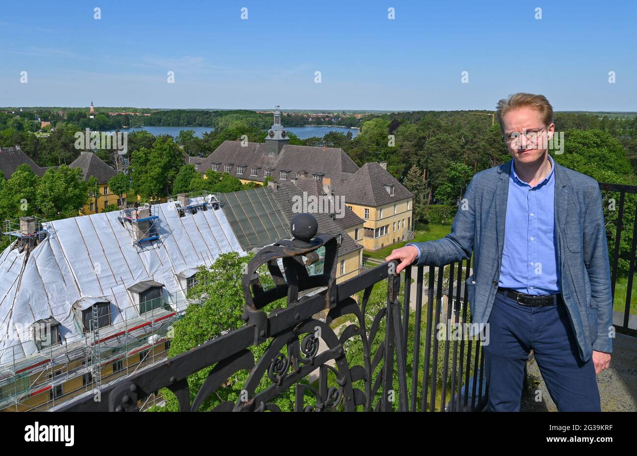 Templin, Germany. 03rd June, 2021. Ferdinand von Saint André, managing director of the foundation 'Gebäudeensemble Joachimsthalsches Gymnasium', stands on the clock tower. There have been many interested parties for the former Joachimsthal grammar school in Templin over the past 30 years. Nothing was done for a long time due to the high renovation costs. Since 2016, a foundation has been working on the listed building complex. A European school is to be built here by 2024. Credit: Patrick Pleul/dpa-Zentralbild/ZB/dpa/Alamy Live News Stock Photo