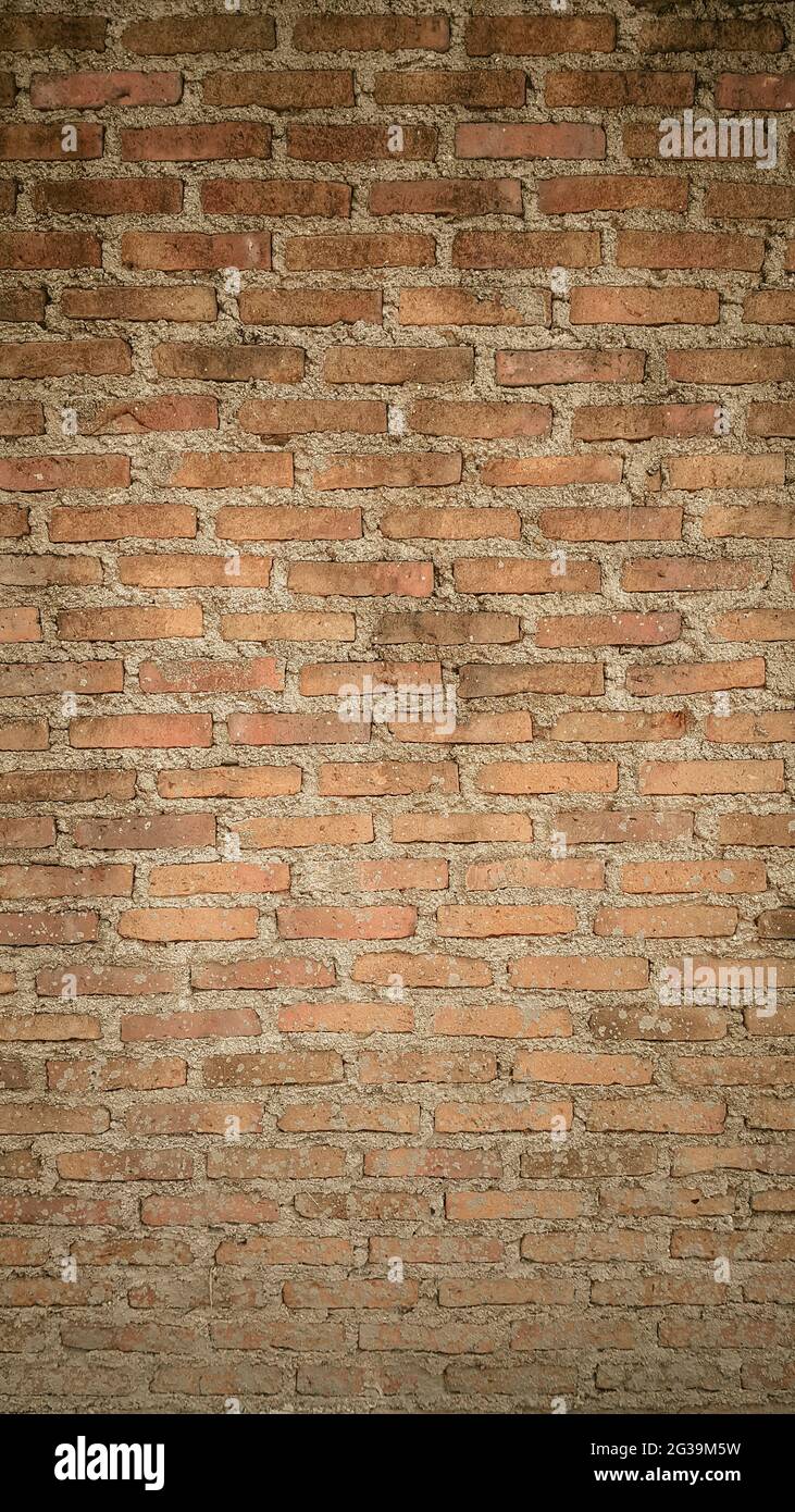 old orange vintage brick wall background Stock Photo - Alamy