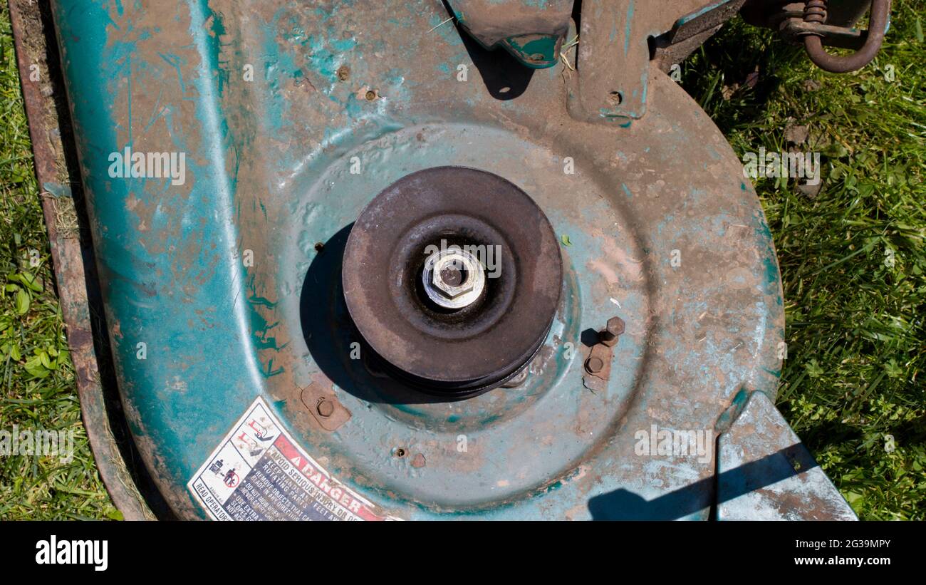 Looking Down on a Pulley on a Mower Deck Stock Photo