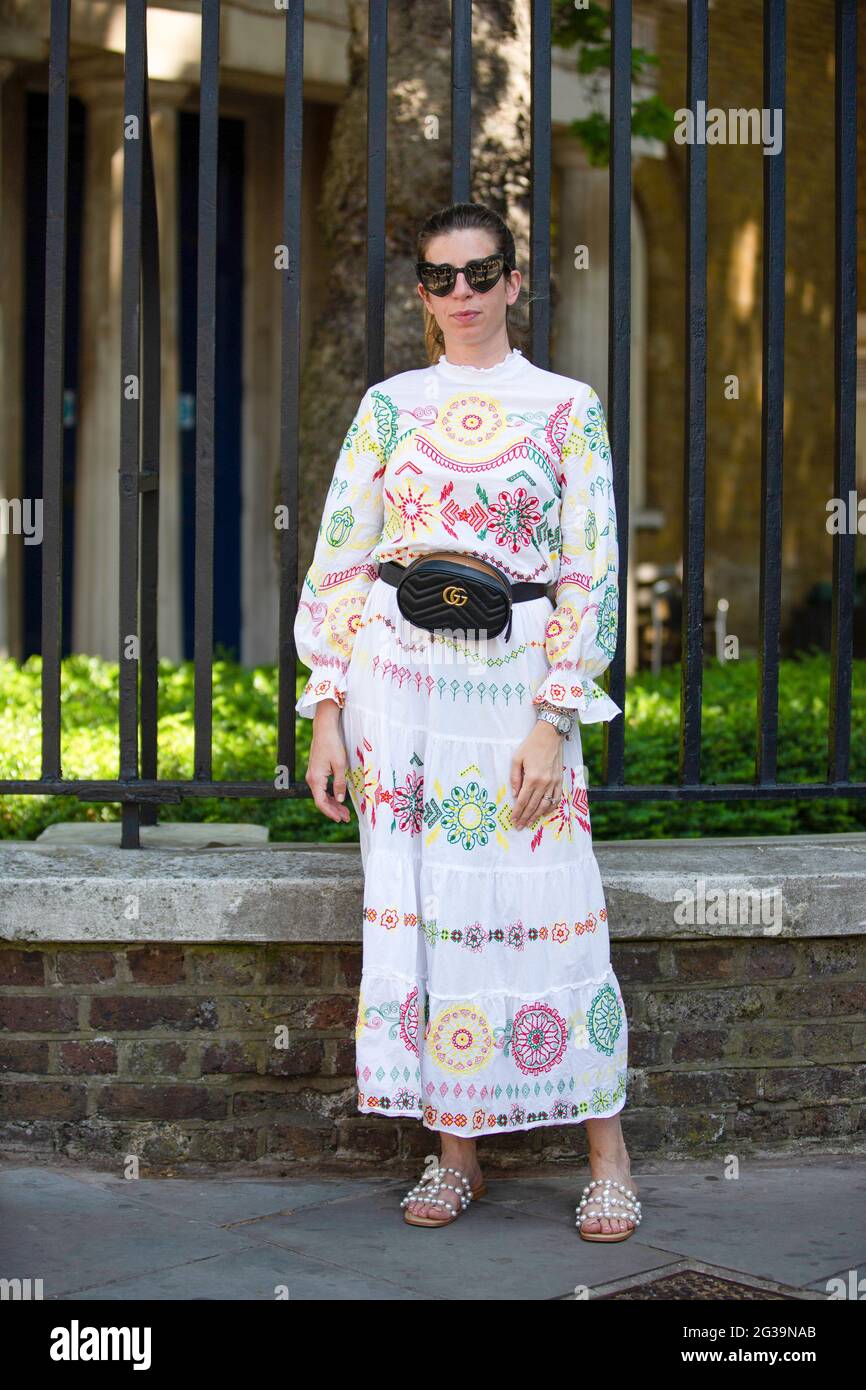 London, UK. 14th June, 2021. Fashionista wears Zara dress, YSL Glasses and Gucci  bag during the London Fashion Week digital shows in London. (Photo by  Pietro Recchia/SOPA Images/Sipa USA) Credit: Sipa USA/Alamy