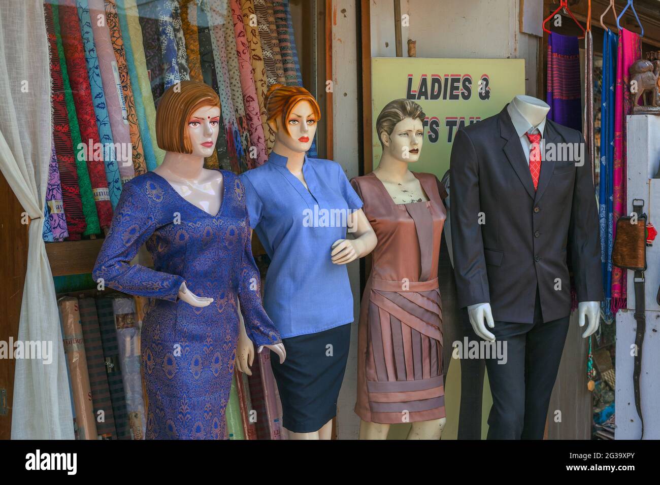 Bizarre faces on shop mannequins outside tailor's shop in Agonda, Goa, India Stock Photo