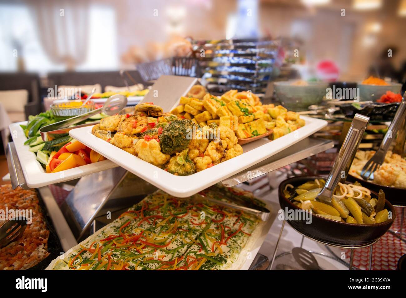 broccoli baked in batter on a white plate. Stock Photo