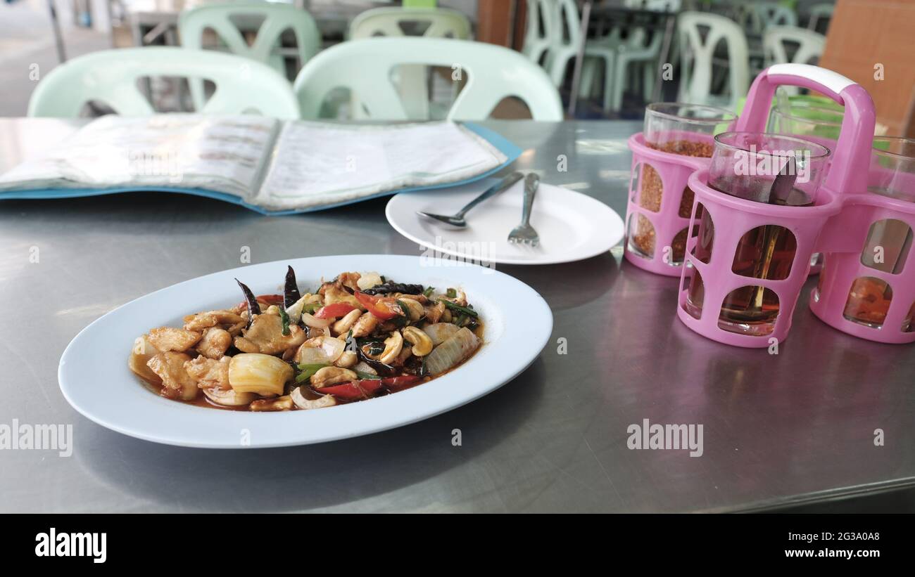 Thai Cashew Nut Chicken Spicy Authentic Local Restaurant North Pattaya Road Pattaya Thailand on the table Flying Vegetable North Pattaya Road Stock Photo