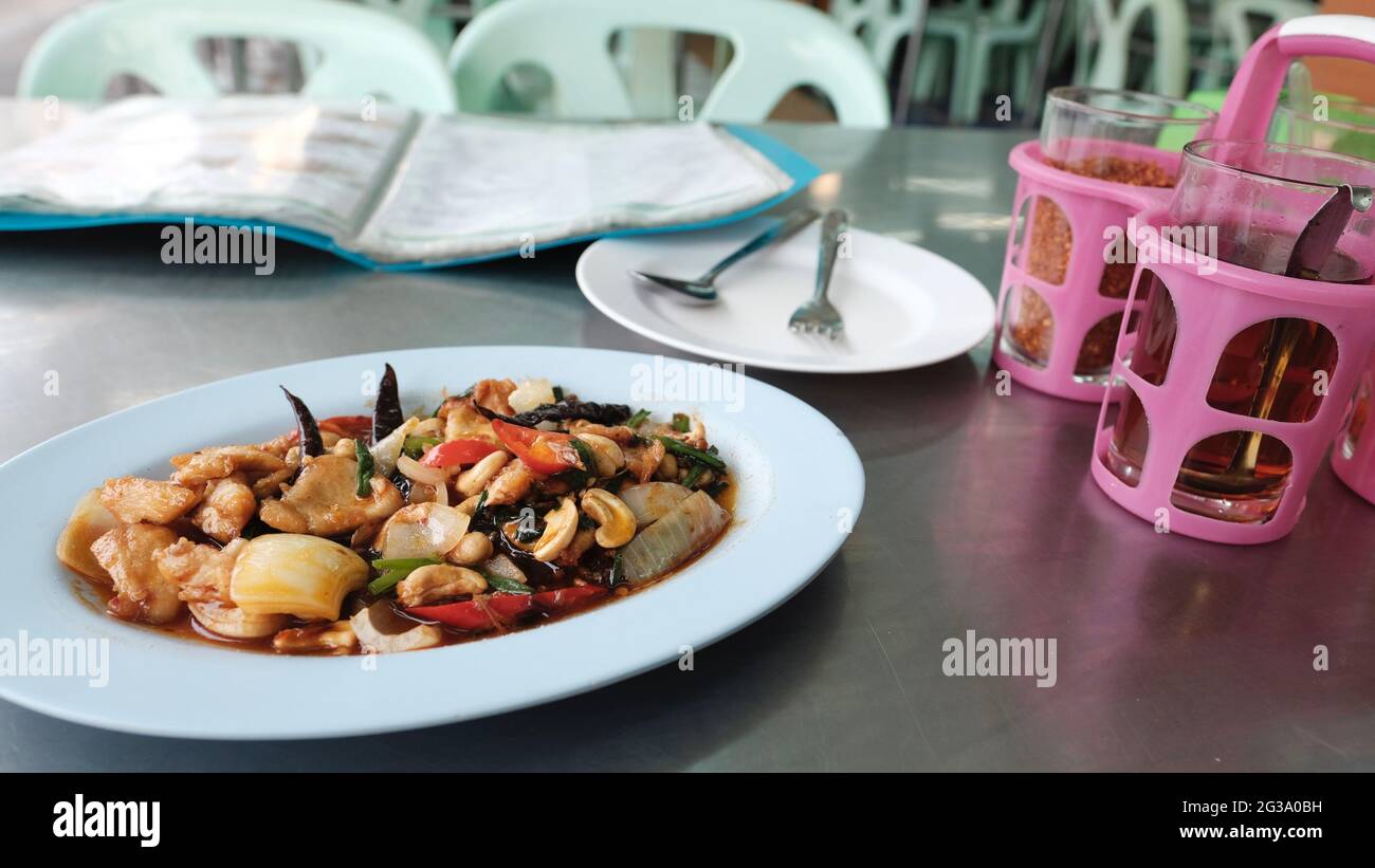 Thai Cashew Nut Chicken Spicy Authentic Local Restaurant North Pattaya Road Pattaya Thailand on the table Flying Vegetable North Pattaya Road Stock Photo