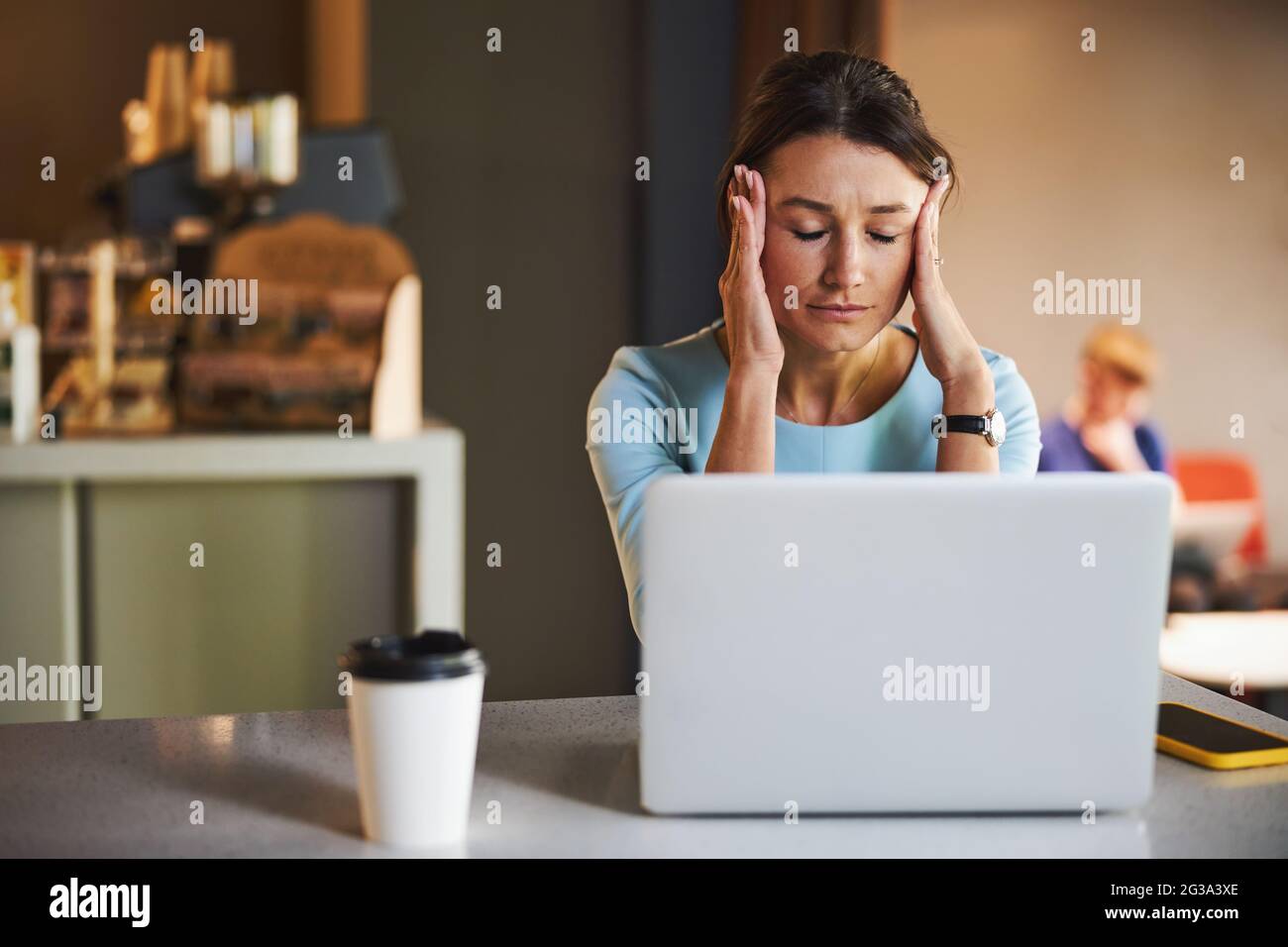 Beautiful elegant woman concerned making difficult decision while she is lost in thoughtful reflecting Stock Photo