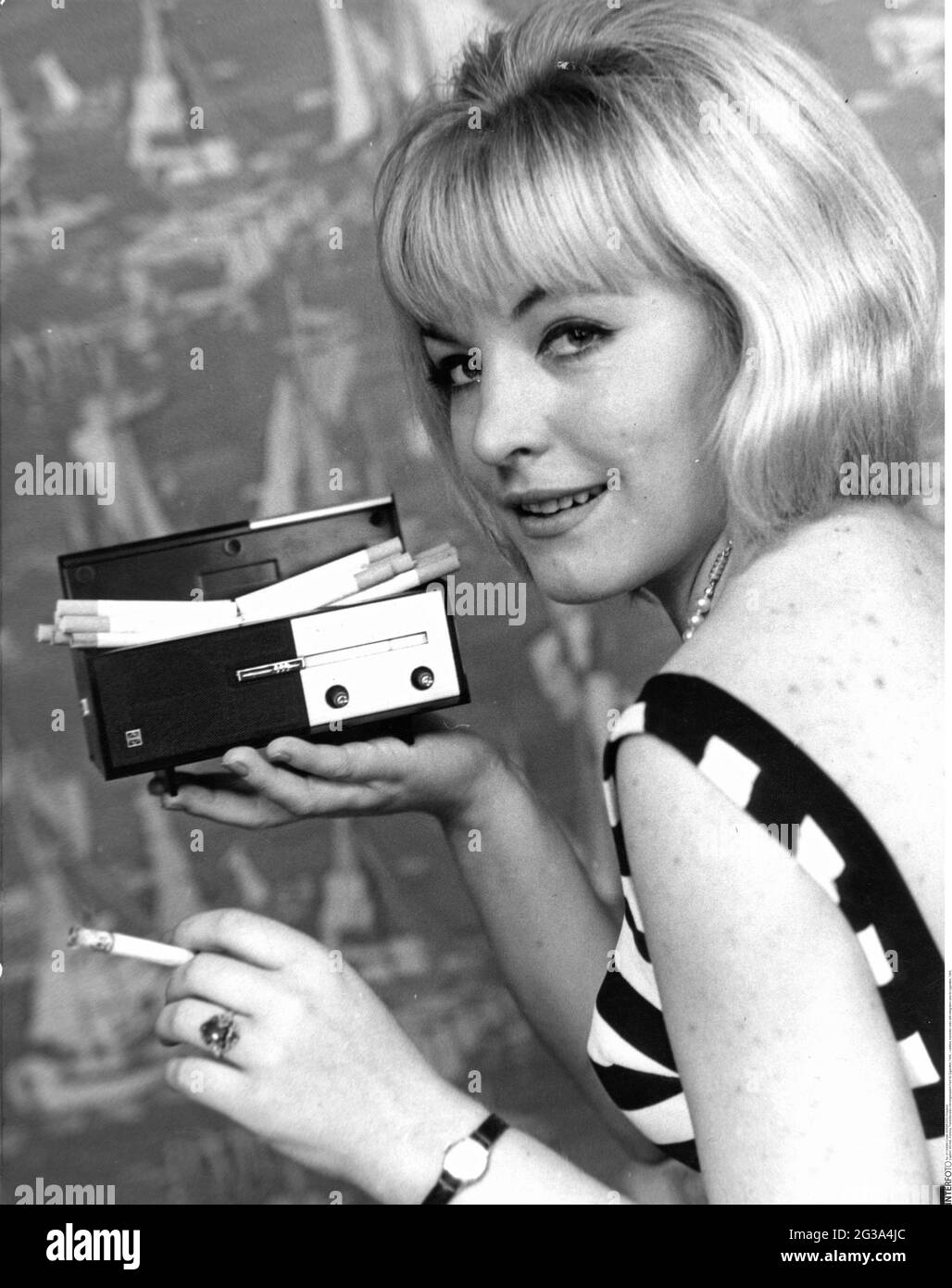 oddities, transistor radio with integrated case for cigarettes, 1964, ADDITIONAL-RIGHTS-CLEARANCE-INFO-NOT-AVAILABLE Stock Photo