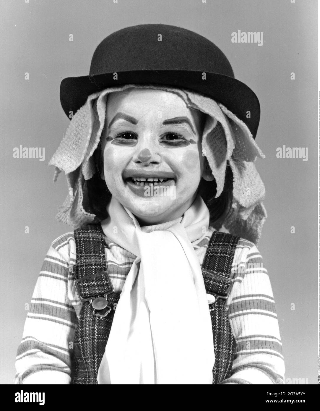 people, children, infants (up to 5 years), girl dressed up as clown, portrait, circa 1970, ADDITIONAL-RIGHTS-CLEARANCE-INFO-NOT-AVAILABLE Stock Photo