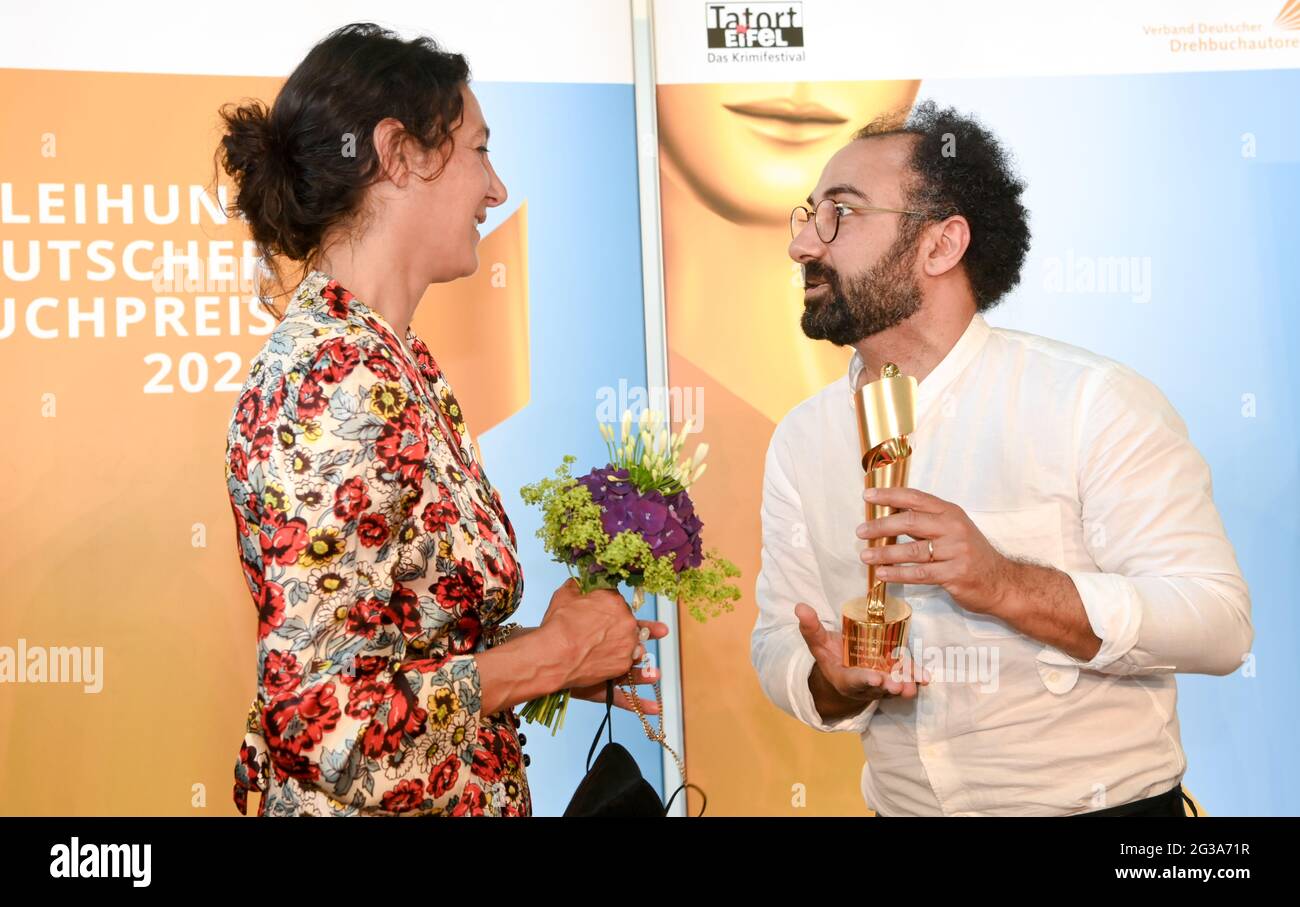 Berlin, Germany. 14th June, 2021. The German-French director and author Emily Atef and the author Behrooz Karamizade at the award ceremony of the Golden Lola 2021 to Behrooz Karamizade for his screenplay "Leere Netze". The German Screenplay Award, which was presented at the Landesvertretung Rheinland-Pfalz, is the most important and highest endowed award for screenwriters in Germany. It was awarded as part of the Berlinale Summer Special. Credit: Jens Kalaene/dpa-Zentralbild/dpa/Alamy Live News Stock Photo