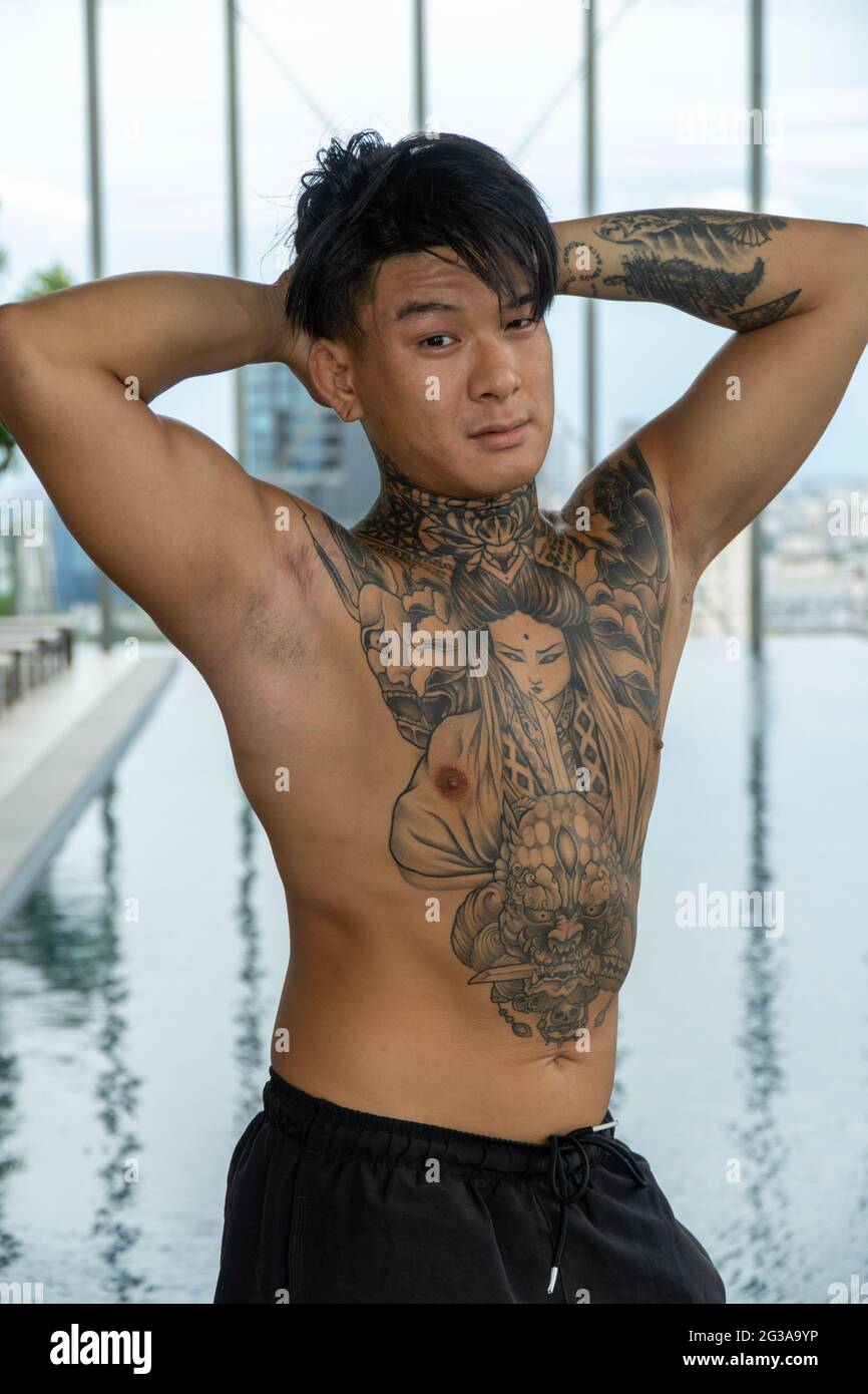 Asian man tattoo hi-res stock photography and images - Alamy