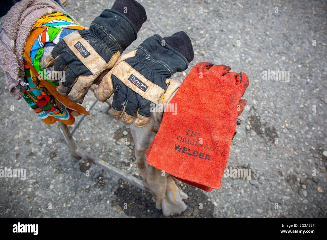 Fire proof gloves are necessary when making traditional Japanese Raku pottery ware. Stock Photo