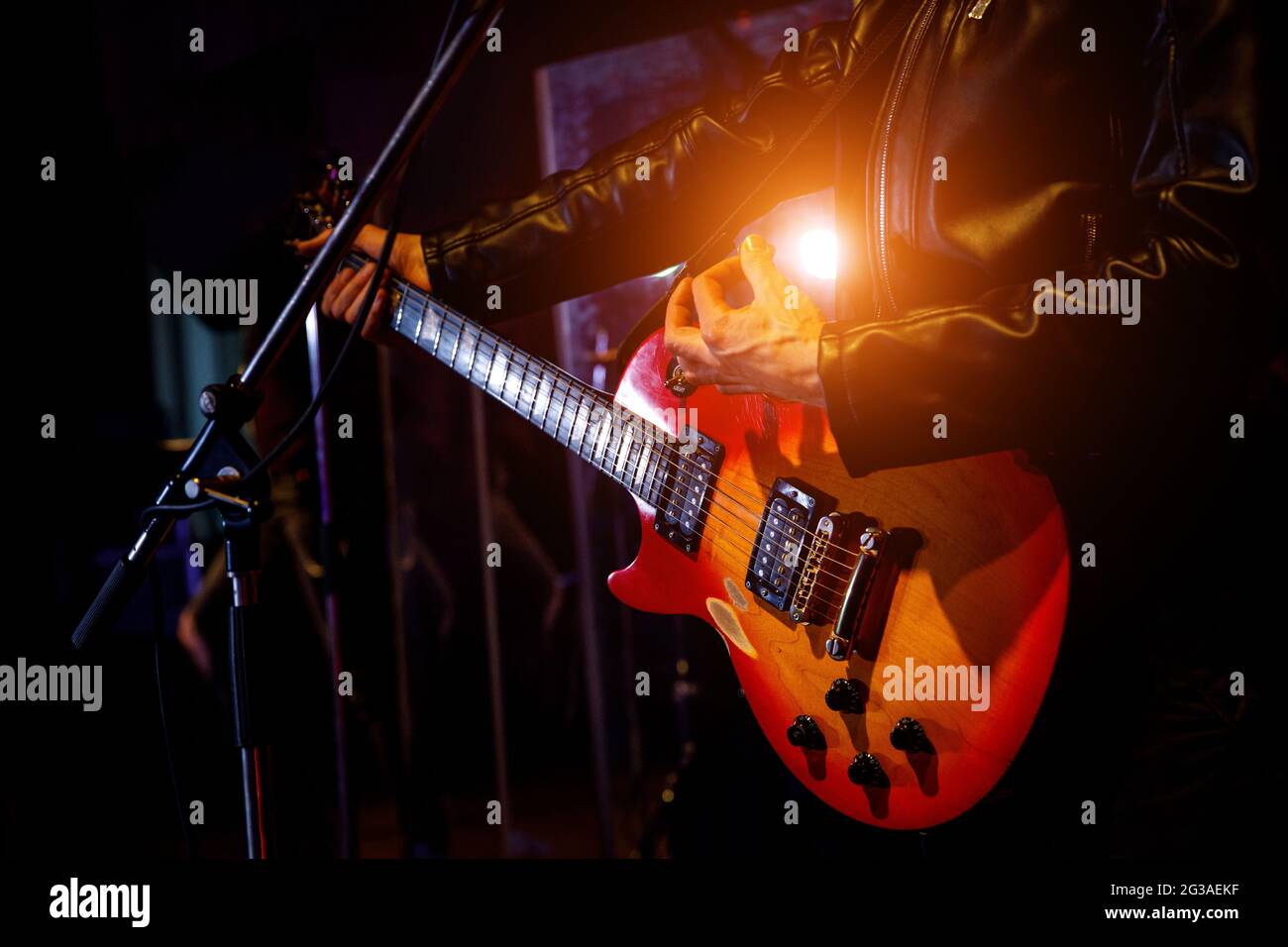 Guitar during a concert. Guitarist on stage Stock Photo Alamy