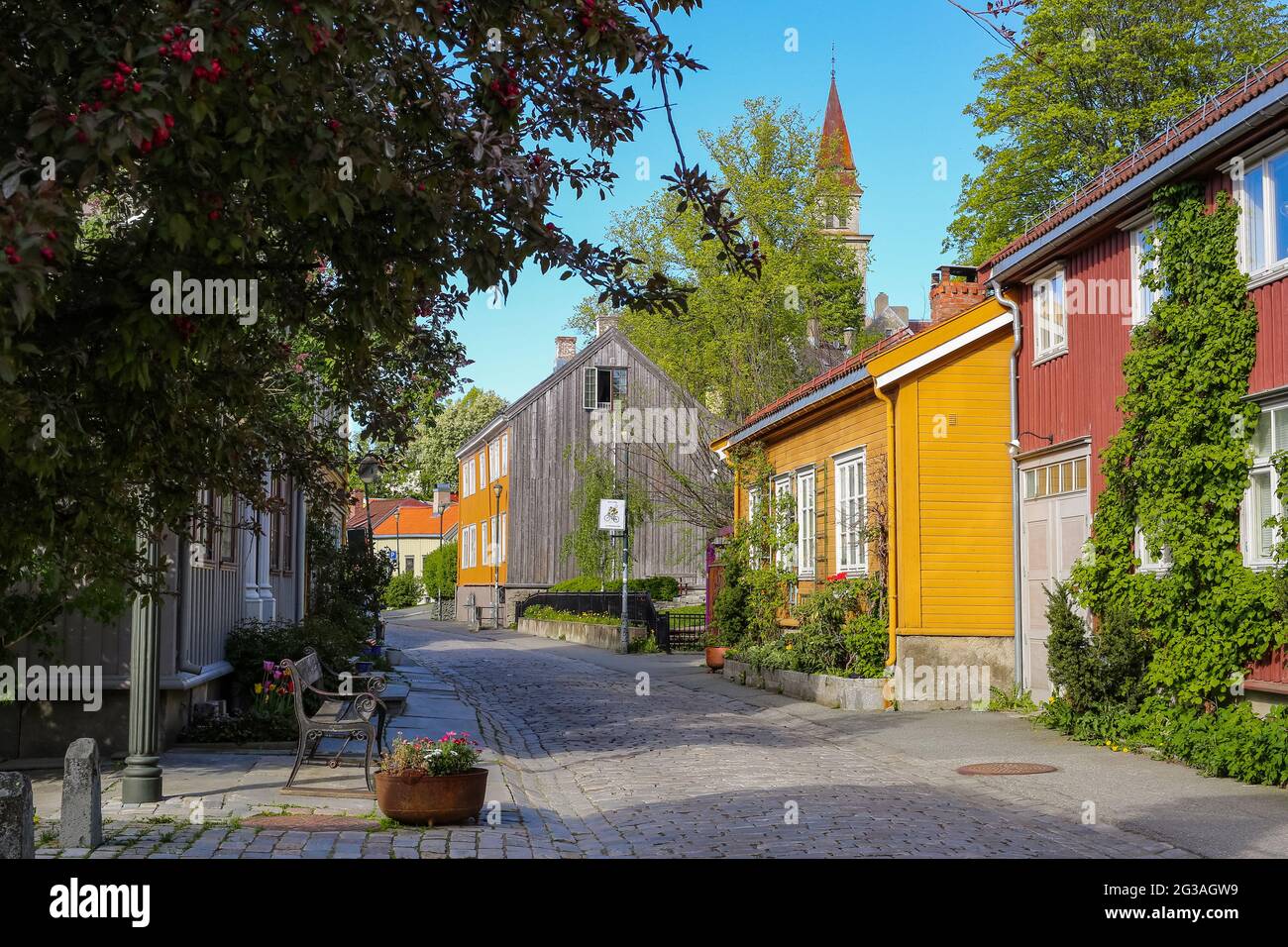The street in Bakklandet, popular touristic district in Norwegian city Trondheim Stock Photo