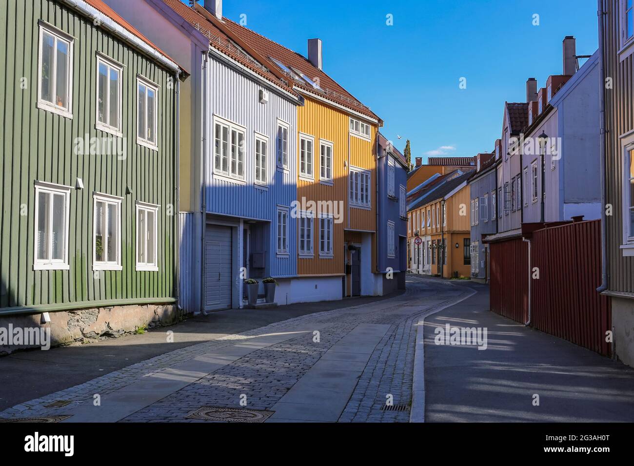 The street in Bakklandet , popular touristic district in Norwegian city Trondheim Stock Photo
