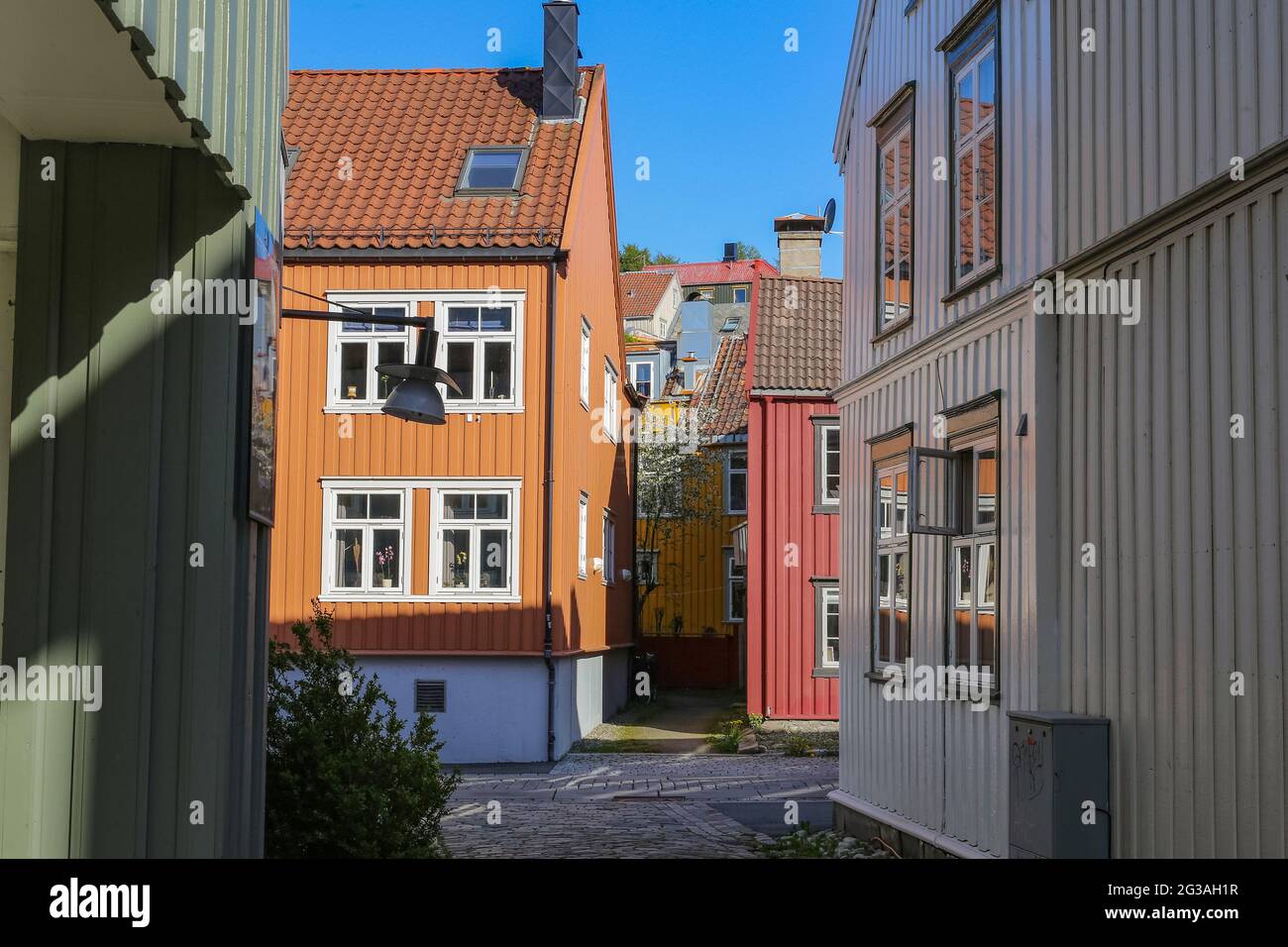 The street in Bakklandet, popular touristic district in Norwegian city Trondheim Stock Photo
