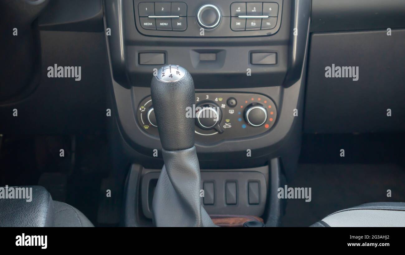 Knob for selecting the gear of a manual gearbox. Manual transmission knob in the car. Closeup