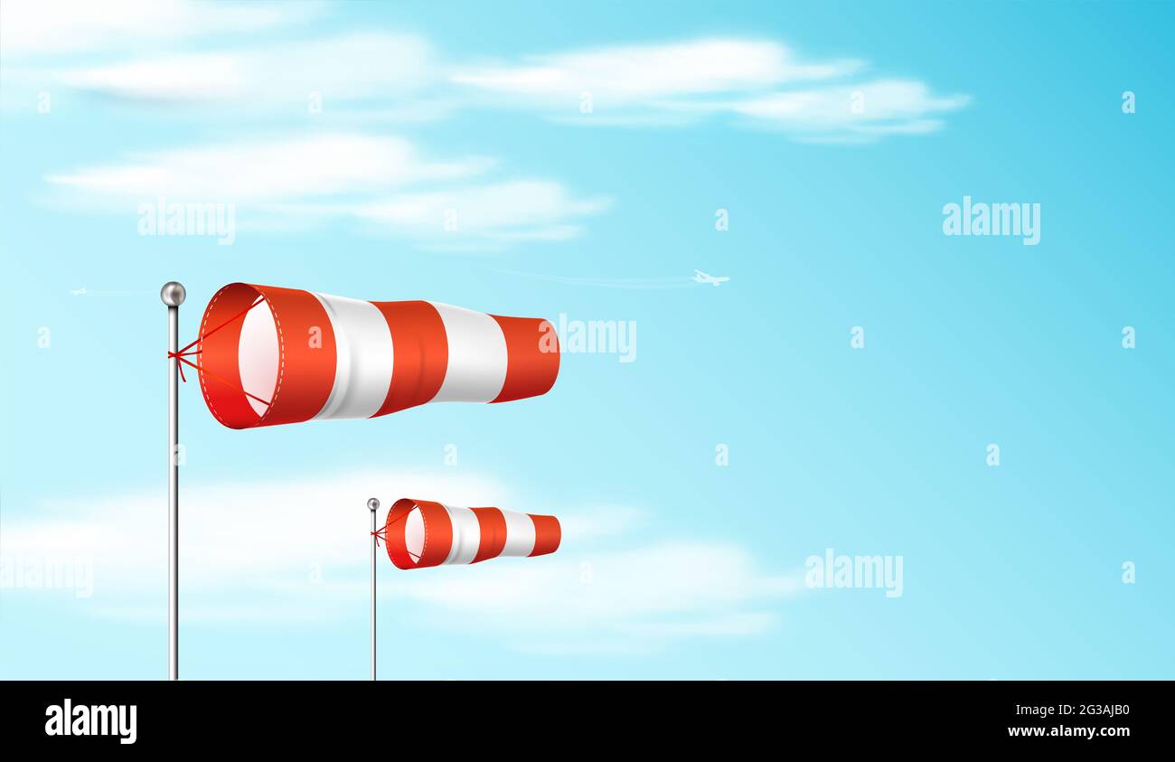Windsock on the blue sky. Red and white airport wind flag showing wind