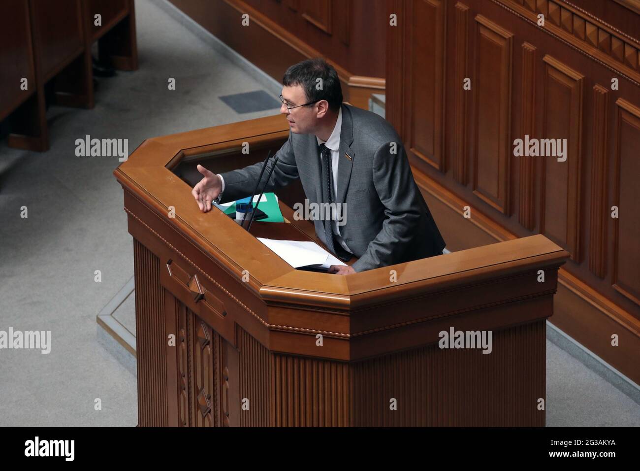 KYIV, UKRAINE - JUNE 15, 2021 - Servant of the People MP Danylo Hetmantsev speaks from the rostrum during a plenary sitting of the Ukrainian parliamen Stock Photo
