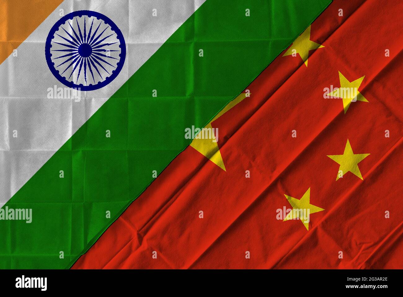 Concept of the relationship between India and China with two flags over each other Stock Photo