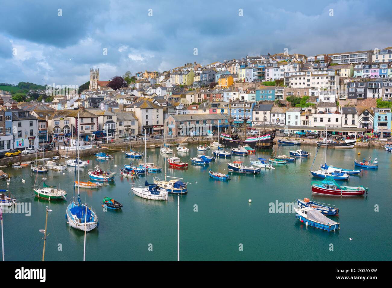 Brixham harbour Devon, view in summer of fishing boats moored in the harbour at Brixham, Torbay, Devon, south west England, UK Stock Photo