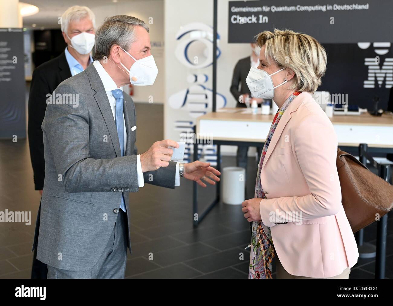 Ehningen, Germany. 15th June, 2021. Martin Jetter (l, Chairmen IBM Europe) talks with Nicole Hoffmeister-Kraut (r, CDU), Minister of Economics of Baden-Württemberg at the official inauguration of the first commercially used quantum computer in Europe. Credit: Bernd Weissbrod/dpa/Alamy Live News Stock Photo