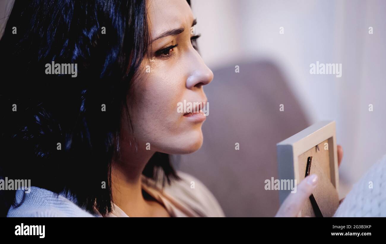 Crying woman photo frame hi-res stock photography and images - Alamy