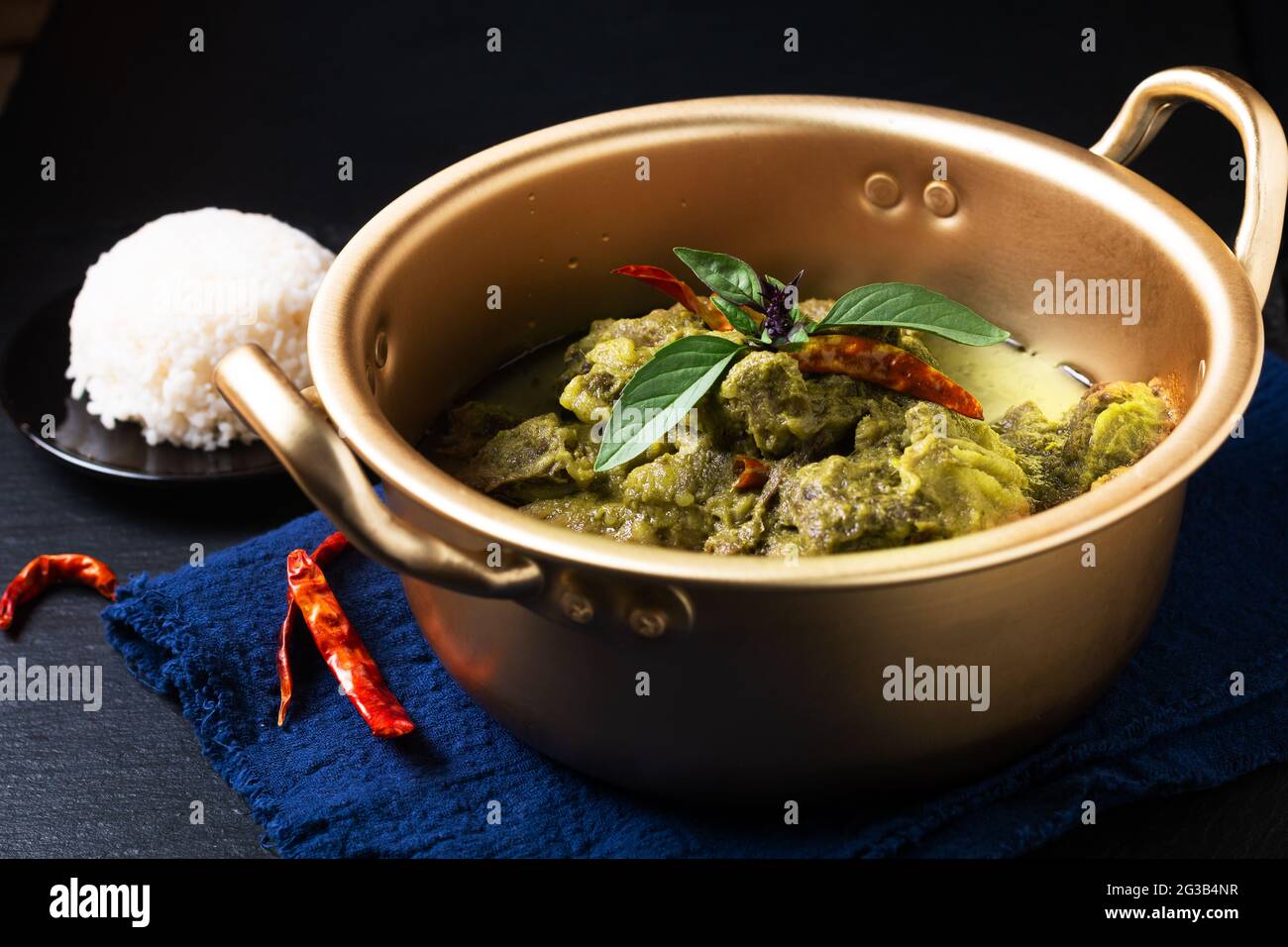 Food concept Thai coconut milk Green curry beef on black background with copy space Stock Photo