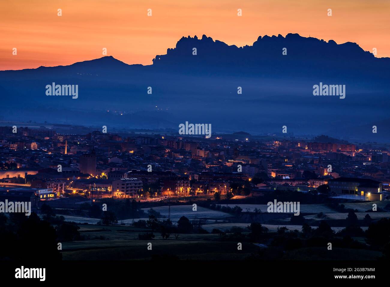 Dawn on the  Montserrat mountain, seen from Igualada city(Barcelona, Catalonia, Spain) ESP: Amanecer en la montaña de Montserrat, desde Igualada Stock Photo