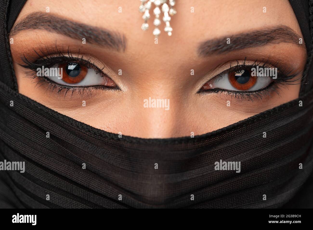 Close up portrait of beautiful muslim girl dressed in hijab Stock Photo ...