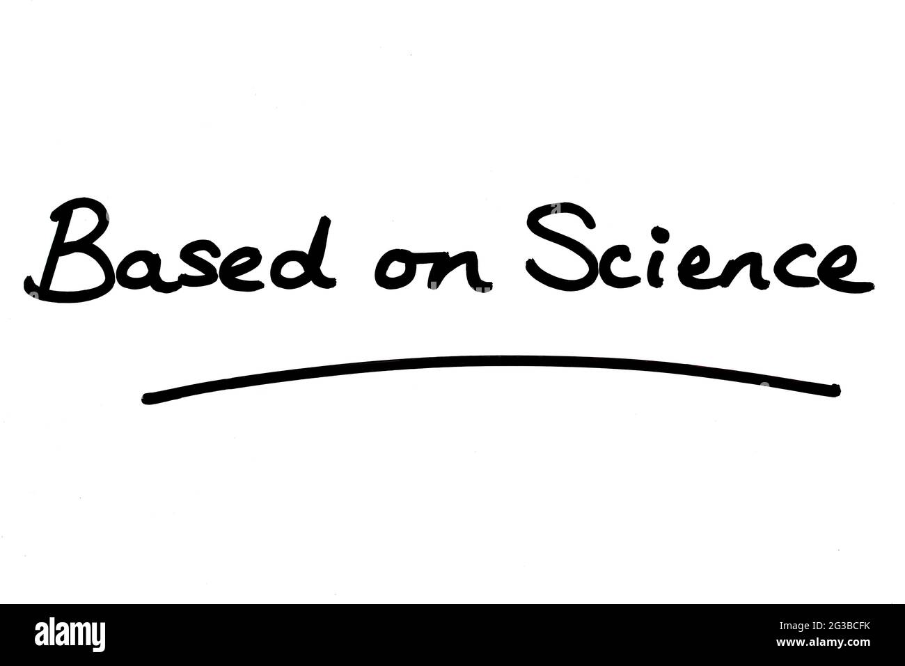 Based on Science, handwritten on a white background. Stock Photo