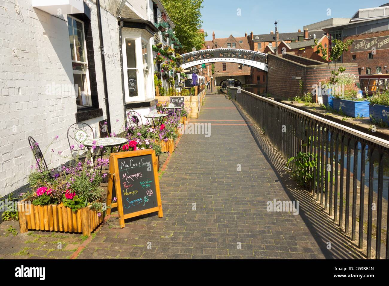 Small cafes and restaurants on the towpath next to the canal in Gas Street Basin Birmingham UK Stock Photo