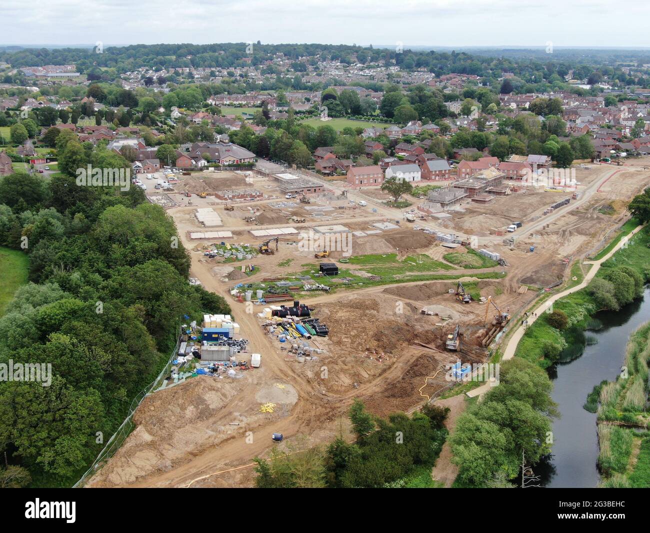 An aerial view of new housing construction on the edge of the countryside and near the town of Wimborne in Dorset Stock Photo