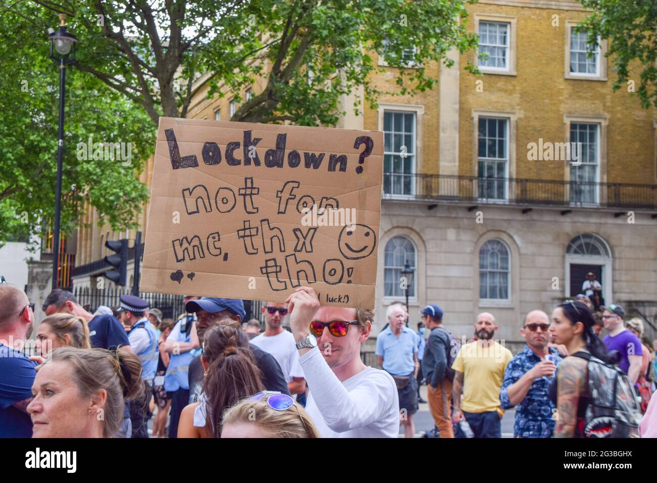 London, United Kingdom. 14th June 2021. Protesters outside Downing Street. Anti-lockdown, anti-vaccine and anti-mask protesters gathered outside Houses of Parliament and Downing Street as the government announced that lifting further COVID-19 restrictions will be delayed until July 19th. Stock Photo