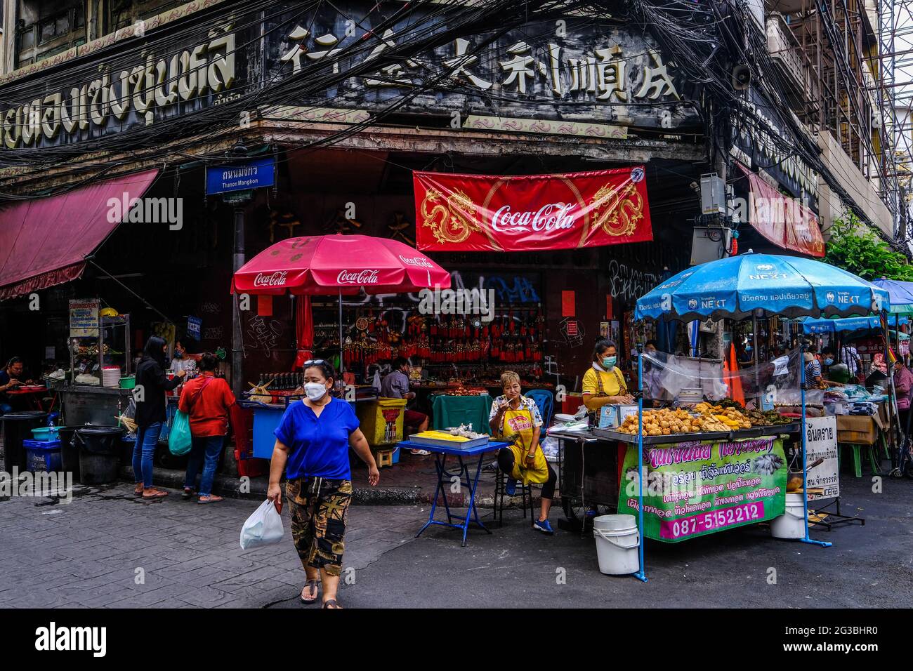 A busy street scene in Chinatown, Bangkok, Thailand. Stock Photo