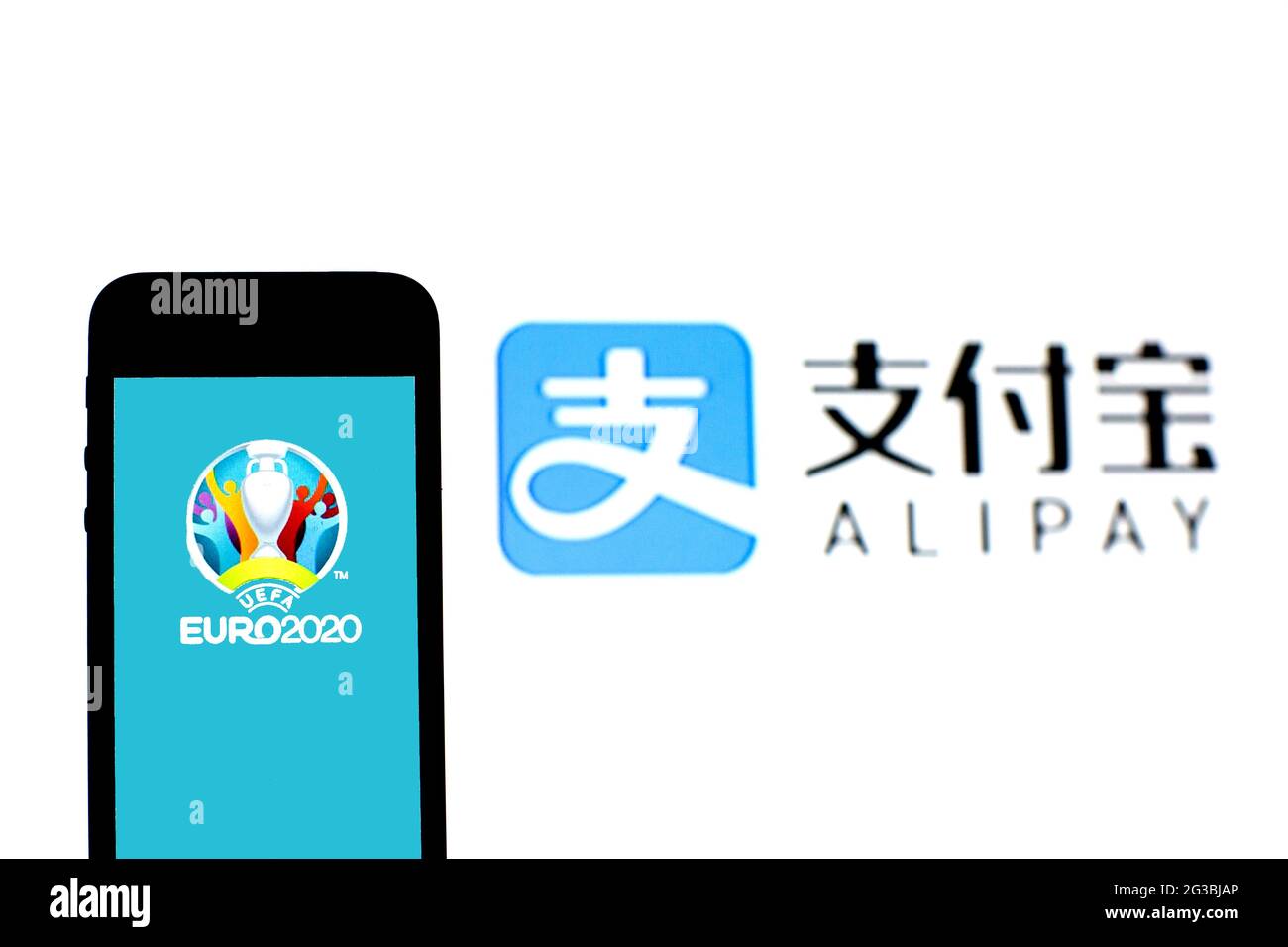 Spain. 15th June, 2021. In this photo illustration a UEFA Euro 2020 logo seen displayed on a smartphone with a Alipay logo in the background. (Photo by Thiago Prudencio/SOPA Images/Sipa USA) Credit: Sipa USA/Alamy Live News Stock Photo