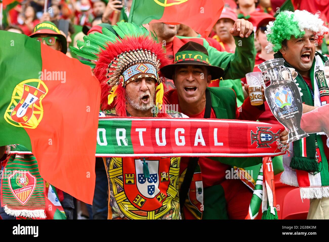 15 June 2021, Hungary, Budapest: Football: European Championship, Hungary -  Portugal, Preliminary Round, Group F, Matchday 1 at Puskás Arena.  Portuguese fans celebrate in the stadium before the match. Important: For  editorial