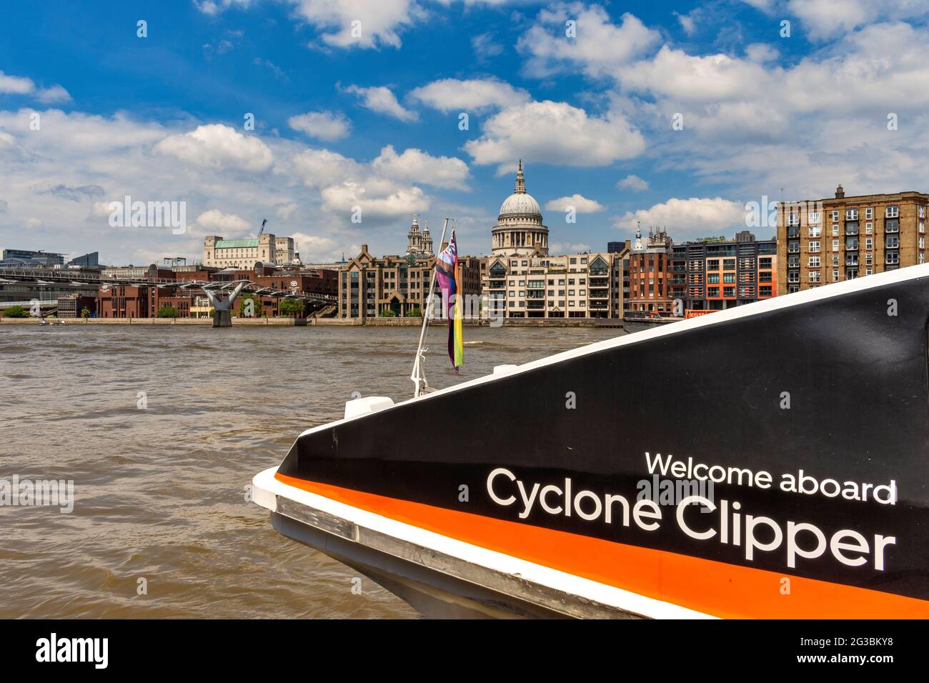 LONDON ENGLAND THAMES CYCLONE CLIPPER AT  BANKSIDE PIER ST. PAULS CATHEDRAL DOME IN THE BACKGROUND Stock Photo
