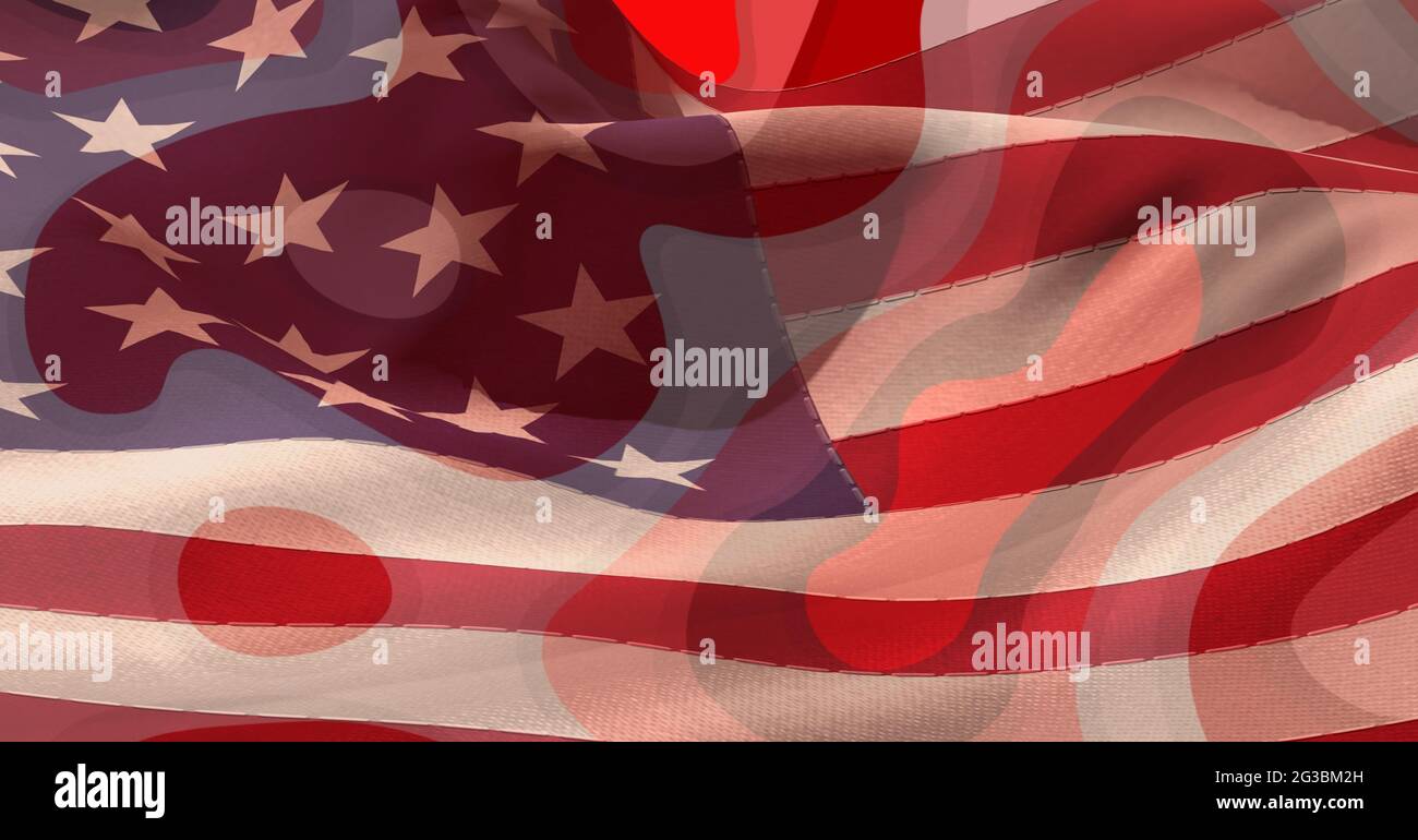 Composition of swirly red pattern with billowing american flag Stock Photo