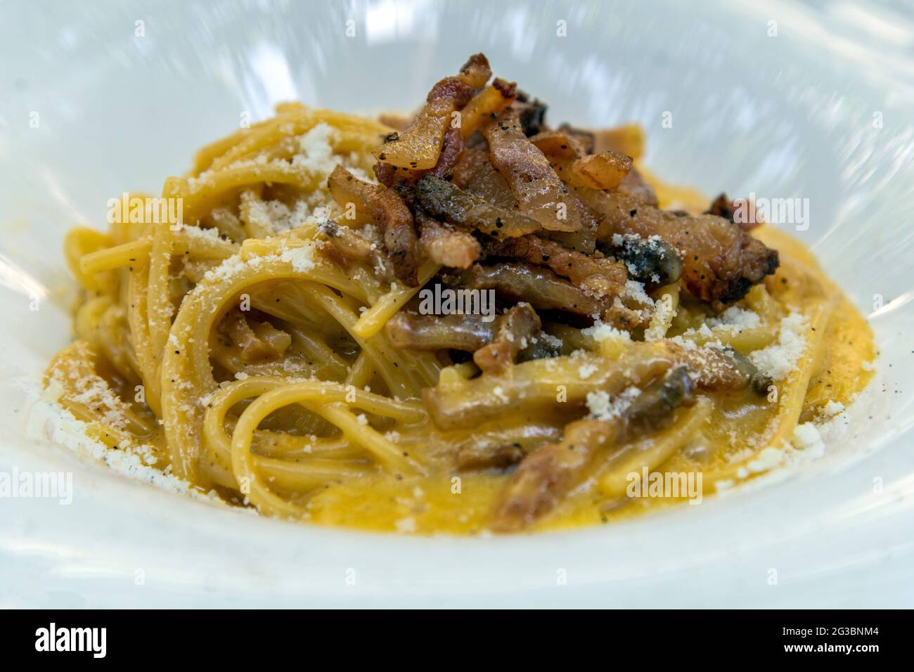Spaghetti Carbonara served in a restaurant of Rome, Lazio, Italy Stock Photo