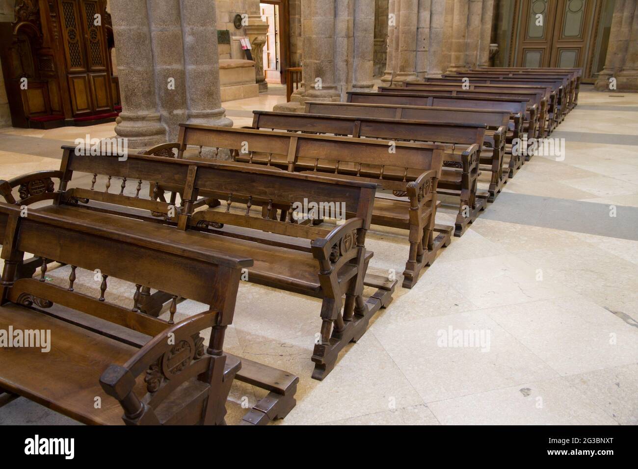 wooden benches of church Stock Photo Alamy