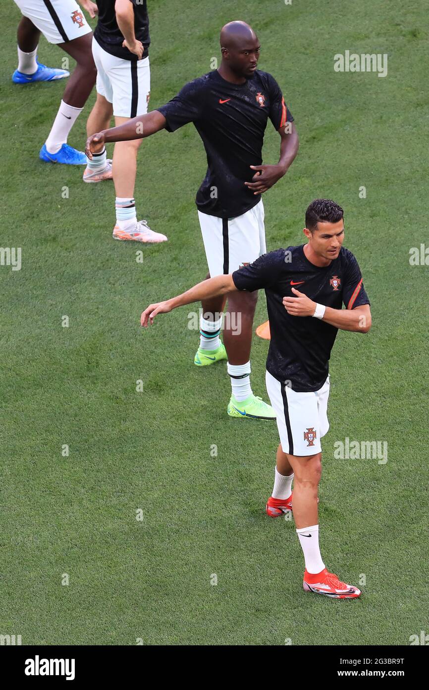 BUDAPEST, HUNGARY - JUNE 15: Danilo Pereira [top] and Cristiano Ronaldo [bottom] warming up before the UEFA Euro 2020 Championship Group F match between Hungary and Portugal on June 15, 2021 in Budapest, Hungary. (Photo by MB Media) Stock Photo