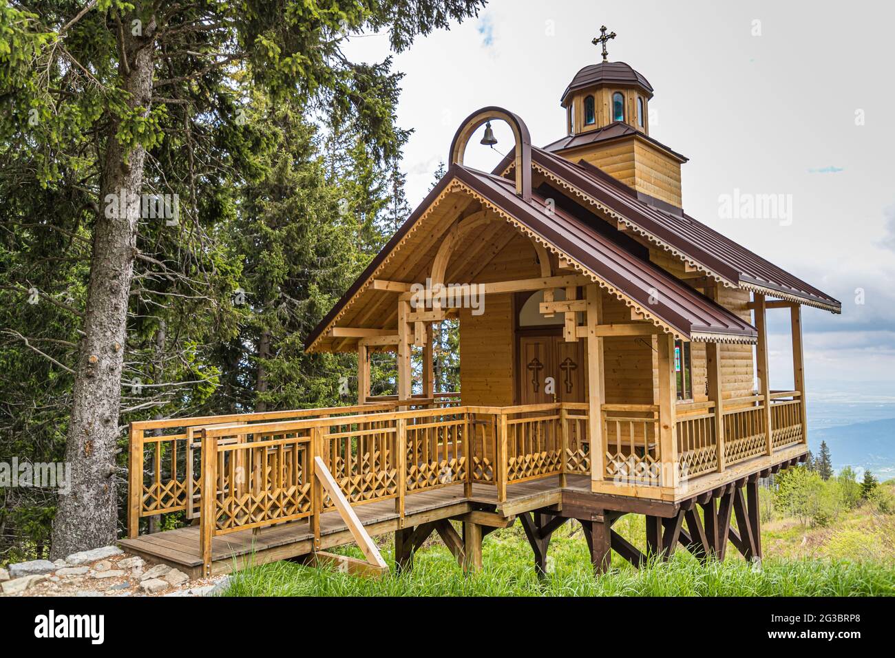 The wooden chapel was built in the nature reserve above Sofia, which was forbidden, but with the subsequent permission of the Orthodox Church. Sofia, Bulgaria Stock Photo