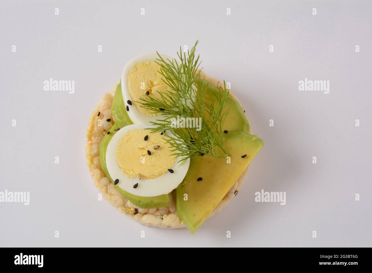 Rice bread Crispy bred, avocado, boiled eggs slices ,and fresh dill