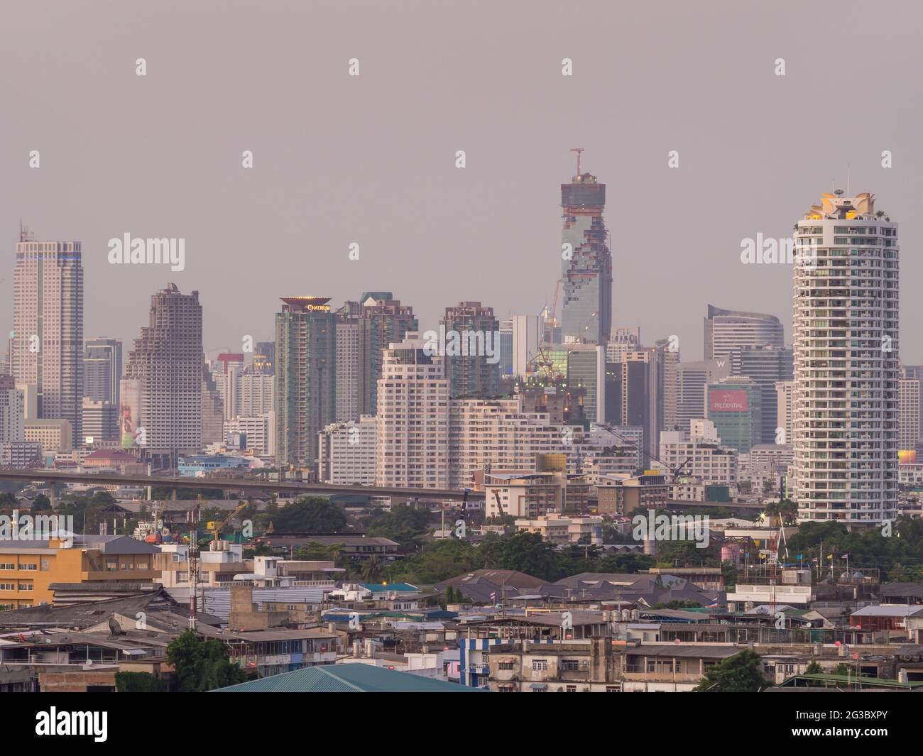 Skyscraper buildings in Bangkok under evening twilight sky Stock Photo ...